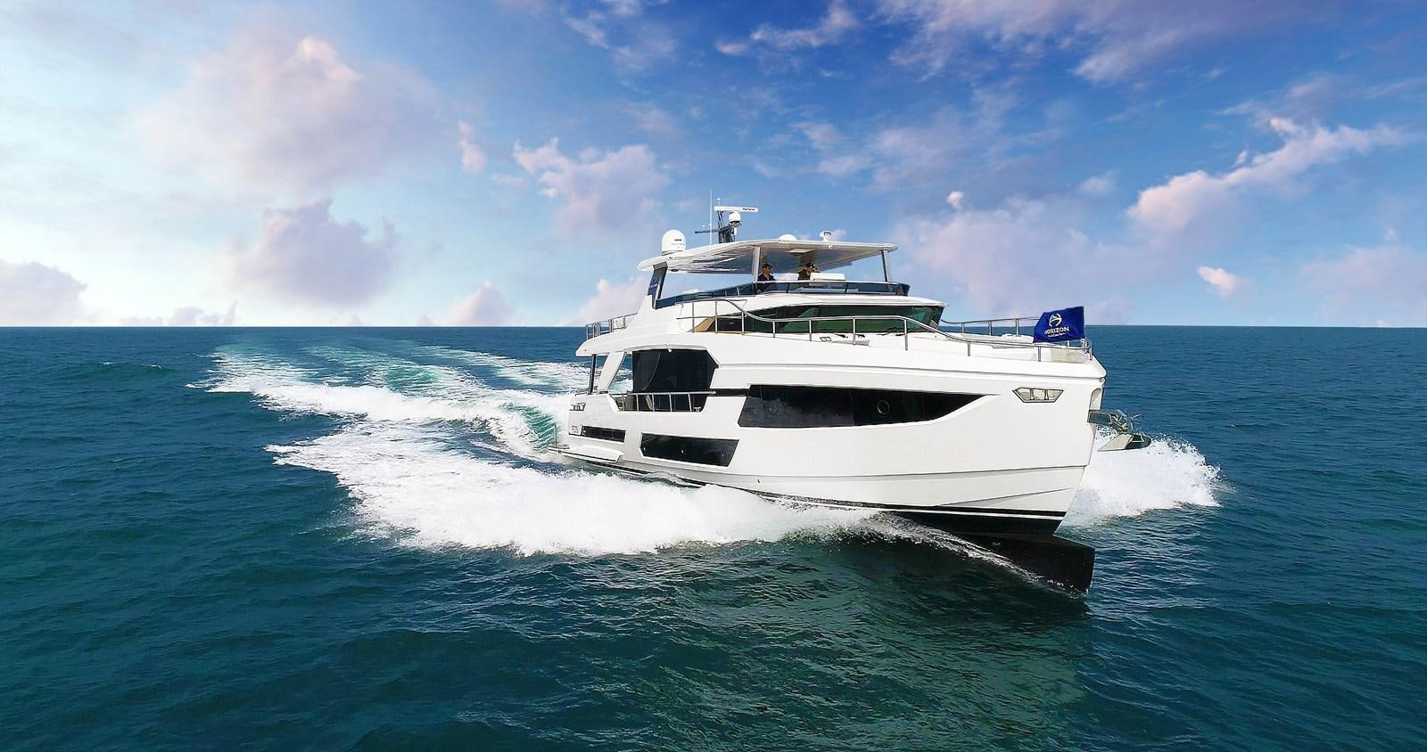 a white boat on the water aboard FD75  709 Yacht for Sale