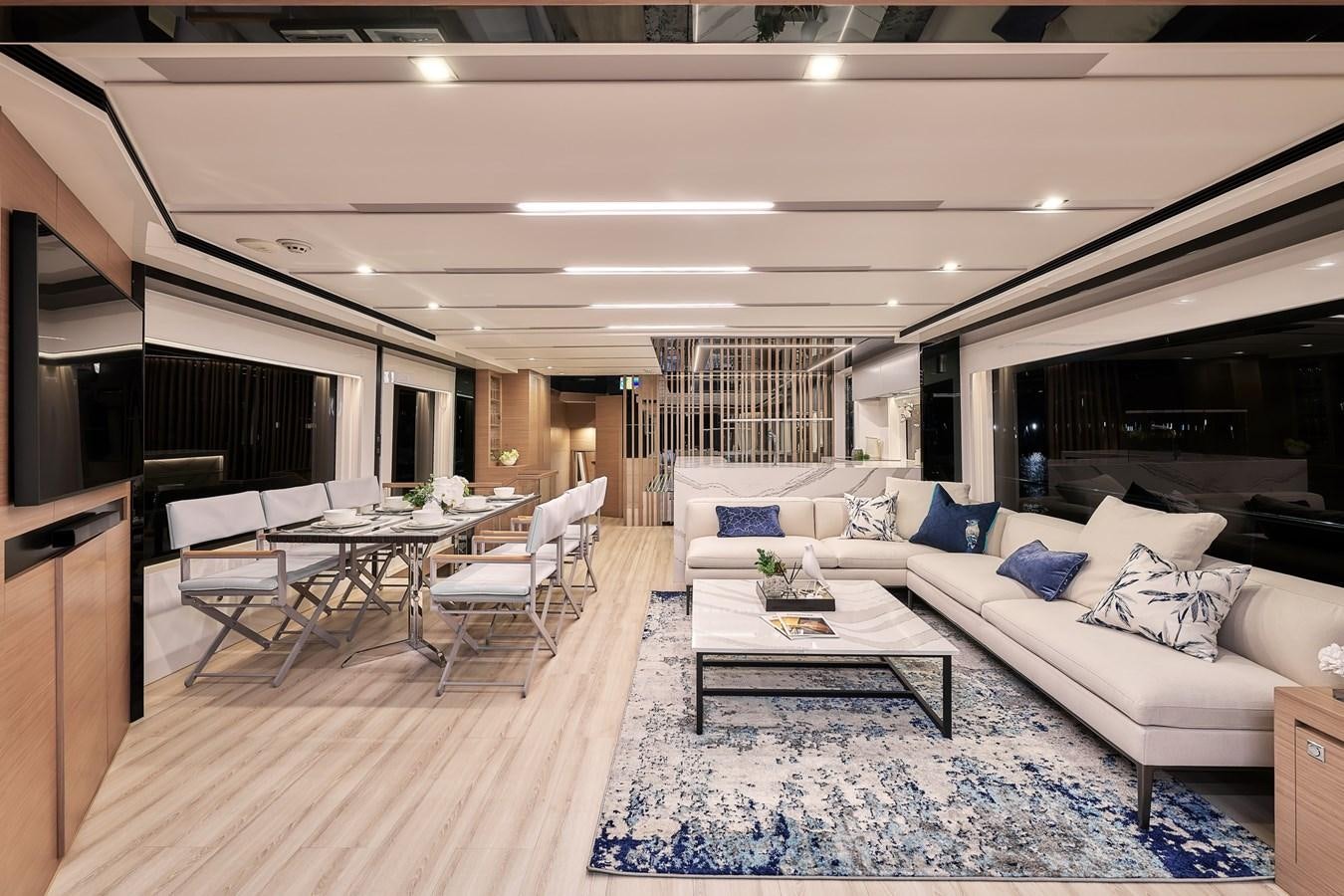 a living room with a white couch and a table aboard FD75  709 Yacht for Sale