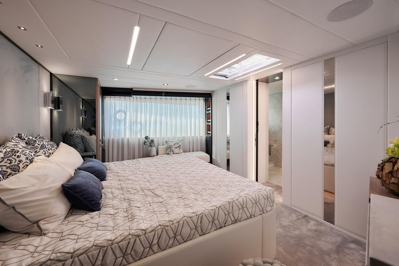 a bedroom with a large bed aboard FD75  709 Yacht for Sale