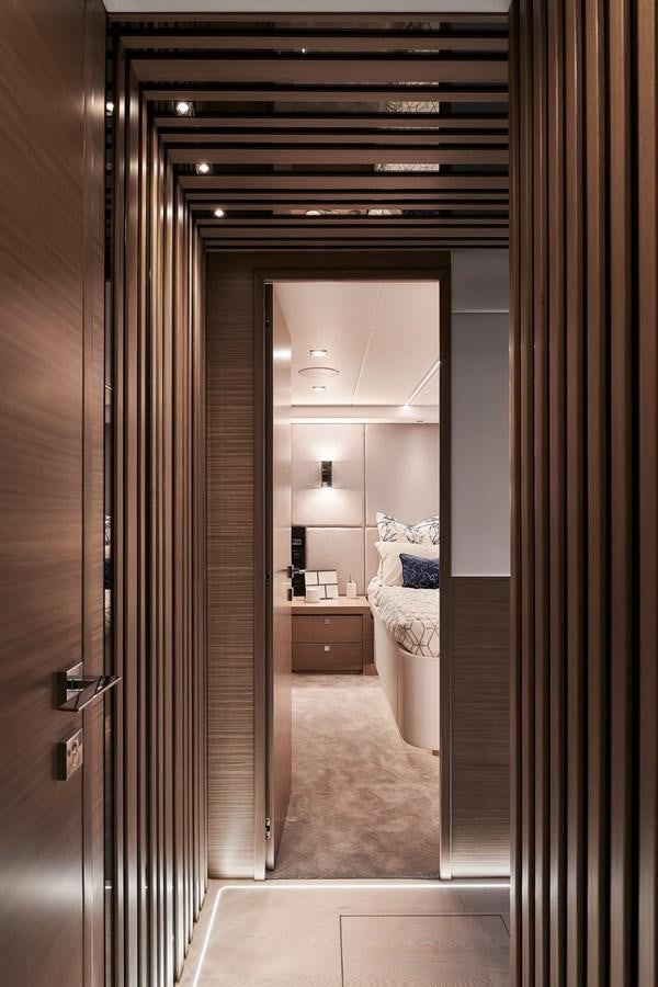 a bathroom with a bed and a mirror aboard FD75  709 Yacht for Sale