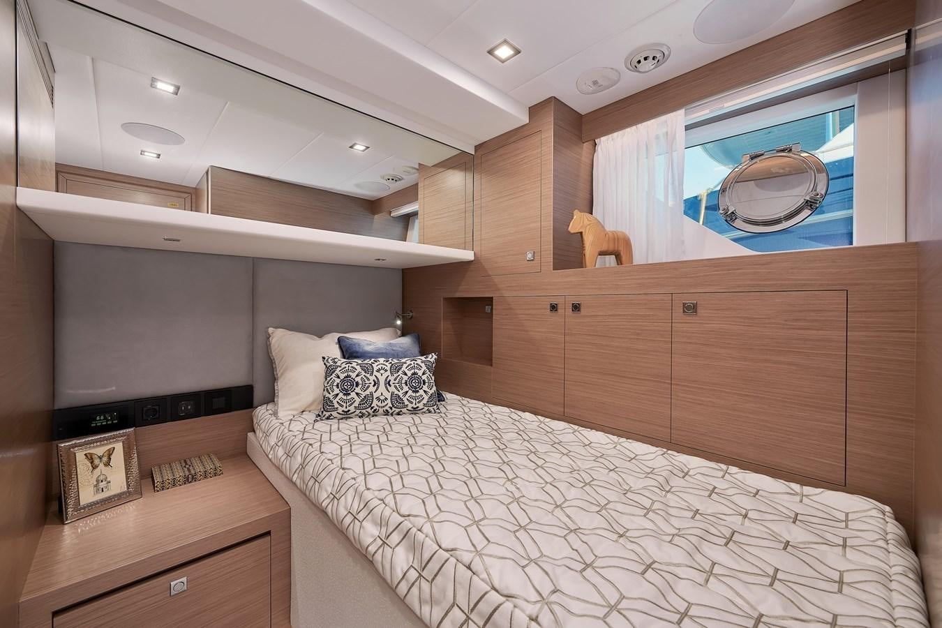 a bedroom with a large bed aboard FD75  709 Yacht for Sale