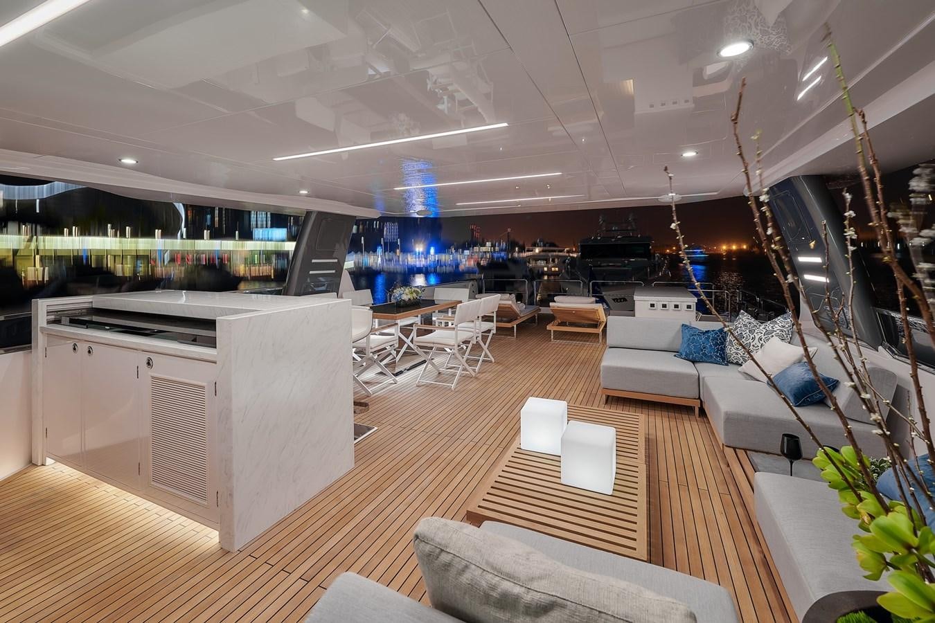 a room with a couch and a table and chairs aboard FD75  709 Yacht for Sale