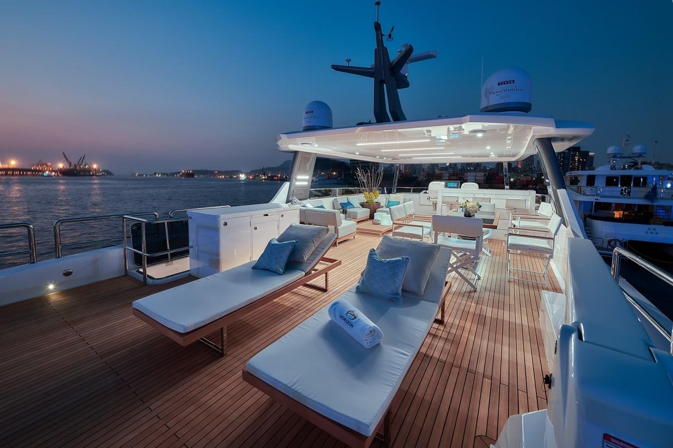 a deck with a deck and a large airplane on it aboard FD75  709 Yacht for Sale