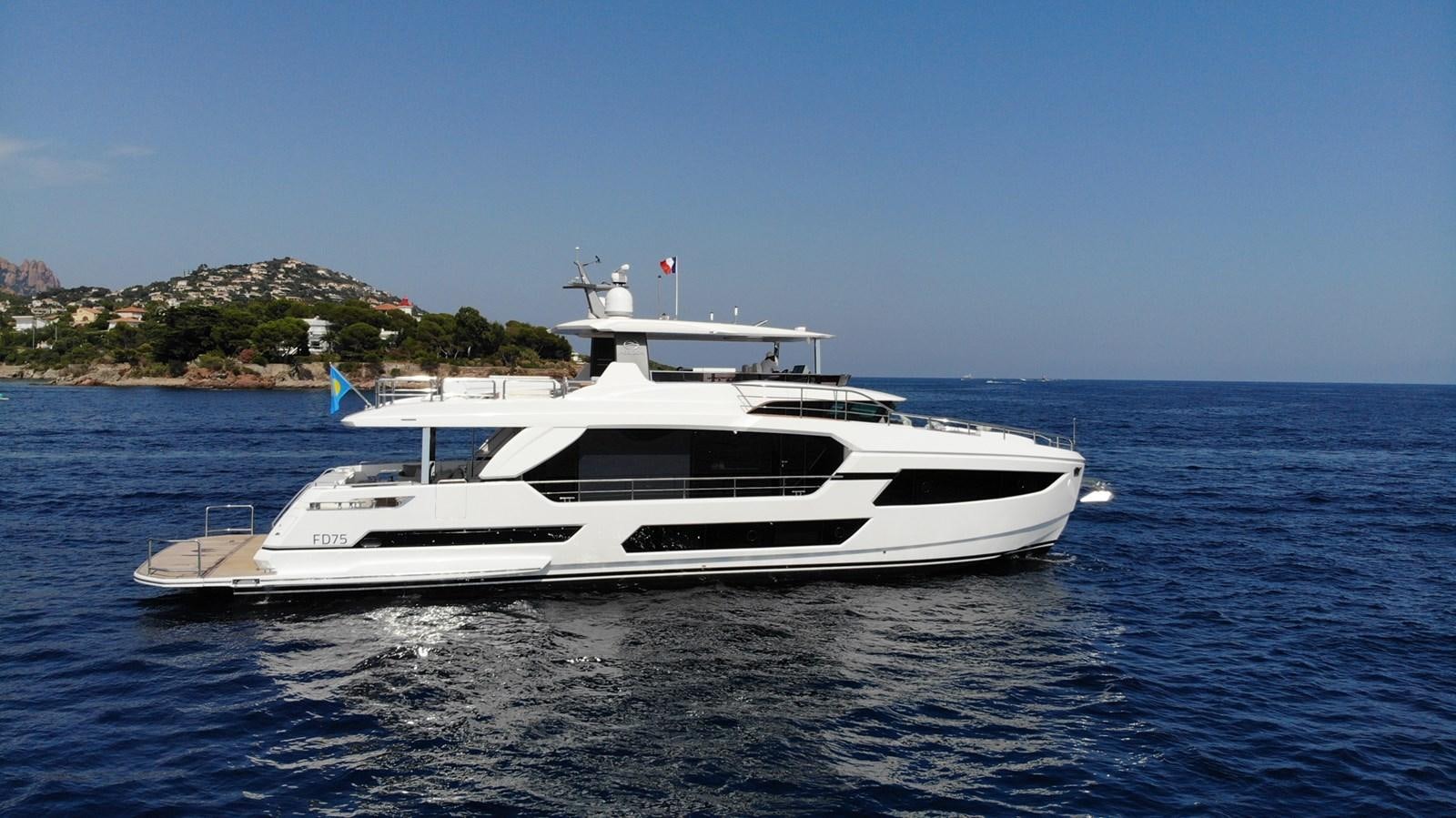 a white yacht on the water aboard FD75  709 Yacht for Sale