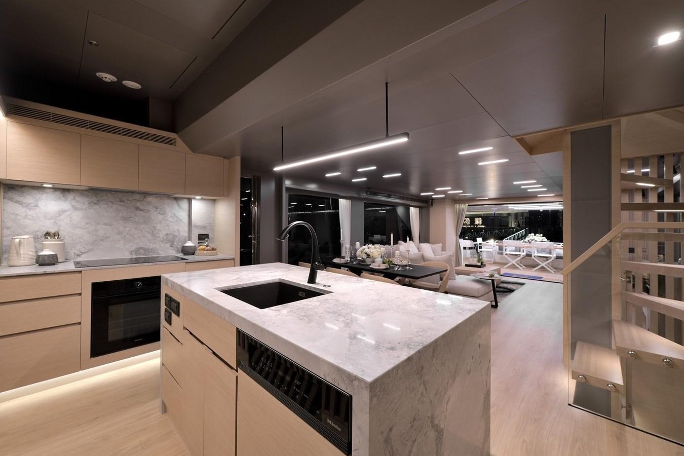 a kitchen with white counter tops aboard FD75  709 Yacht for Sale