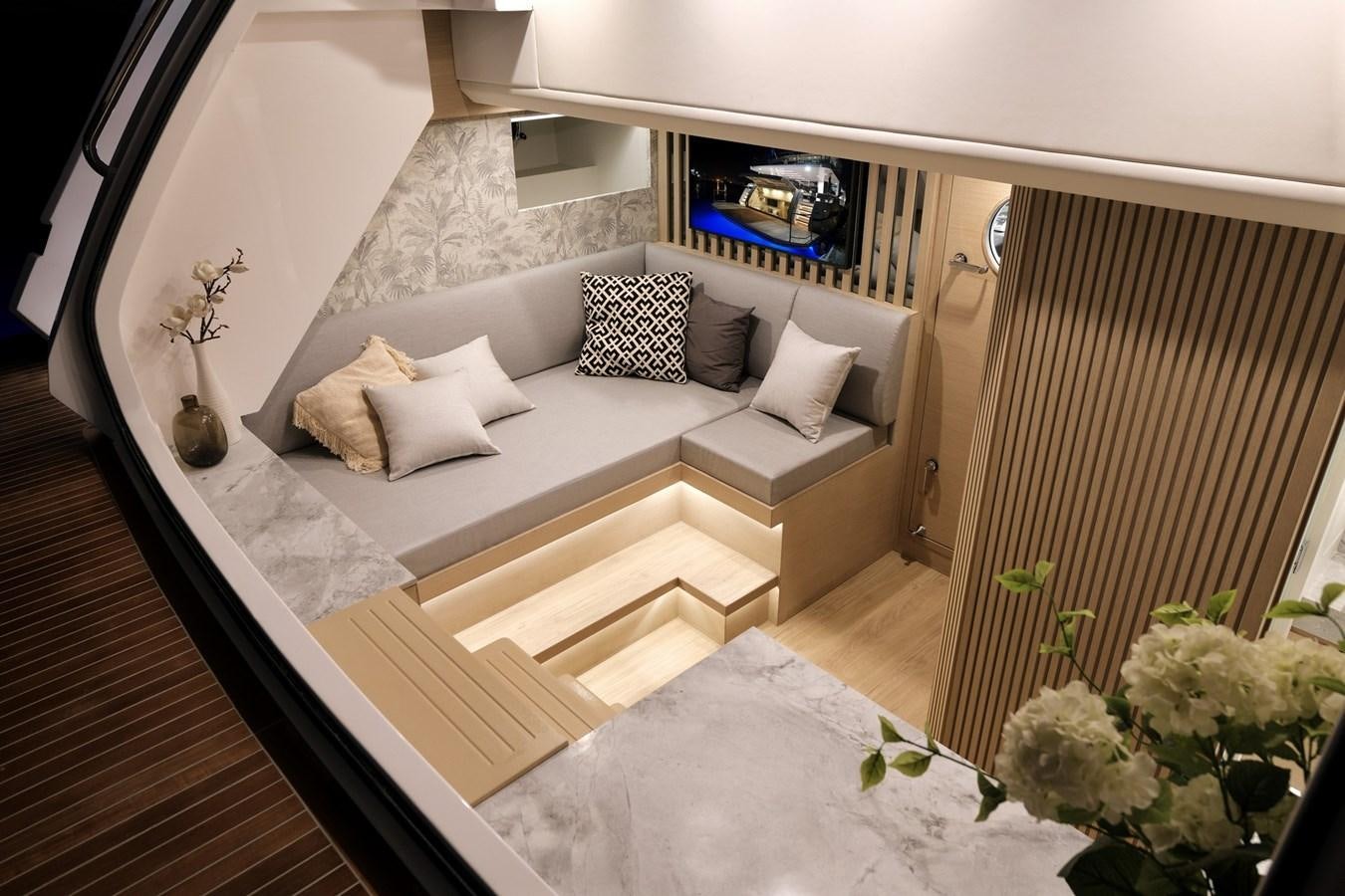 a room with a bed and a table aboard FD75  709 Yacht for Sale