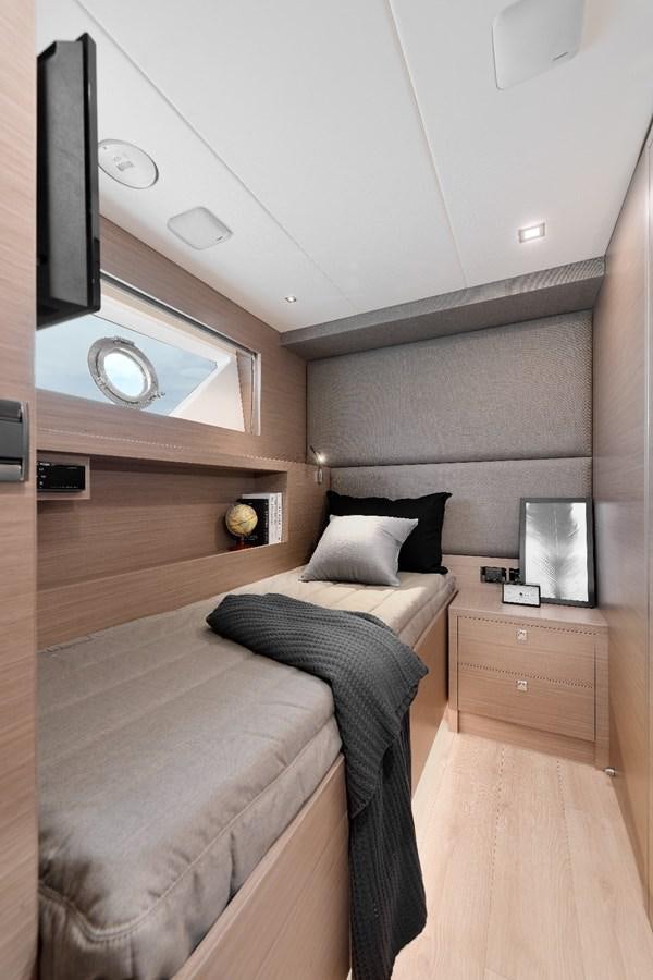 a room with a bed and a television aboard FD75  709 Yacht for Sale