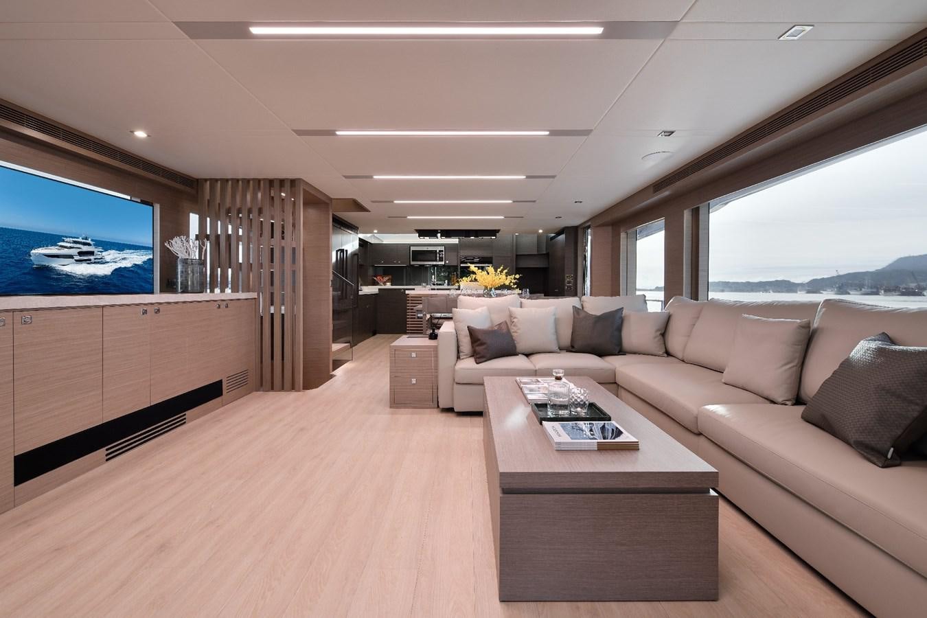 a living room with a couch and a tv aboard FD75  709 Yacht for Sale