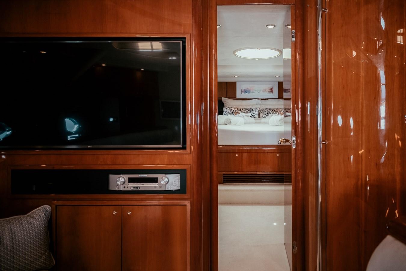a tv on a cabinet aboard HOURI Yacht for Sale