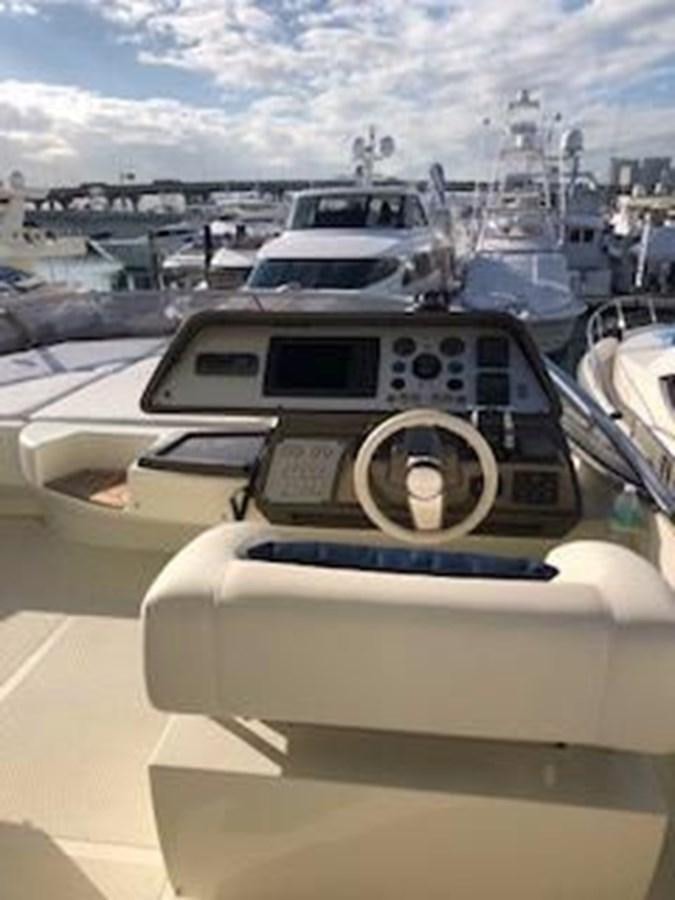 a car on a road aboard 2013 RIVA 75 VENERE SUPER Yacht for Sale