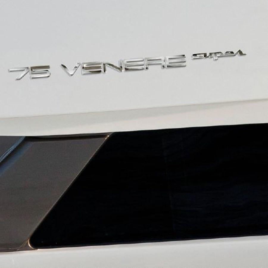 a white keyboard with a black rectangular object on it aboard 2013 RIVA 75 VENERE SUPER Yacht for Sale
