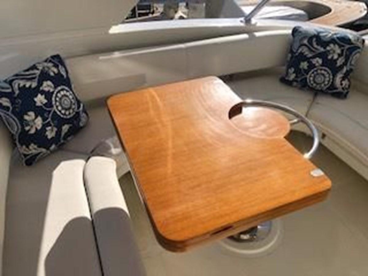 a pair of sunglasses on a table aboard 2013 RIVA 75 VENERE SUPER Yacht for Sale