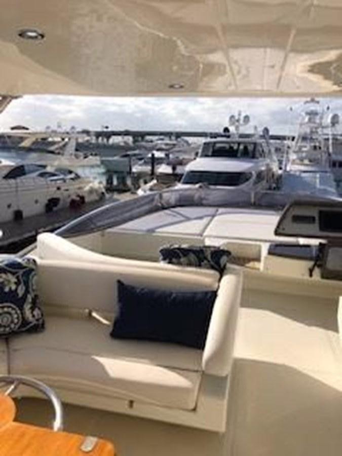 a room with a view of a city and a large body of water aboard 2013 RIVA 75 VENERE SUPER Yacht for Sale