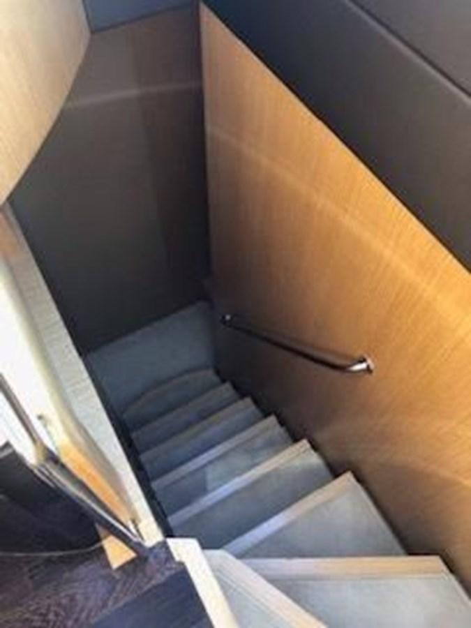 a wooden cabinet with a drawer aboard 2013 RIVA 75 VENERE SUPER Yacht for Sale