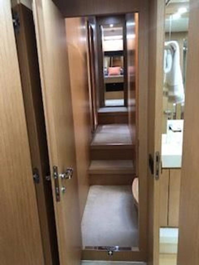 a door with a mirror aboard 2013 RIVA 75 VENERE SUPER Yacht for Sale
