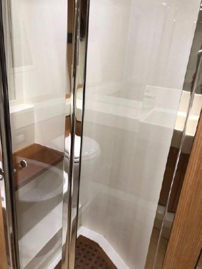 a shower with a glass door aboard 2013 RIVA 75 VENERE SUPER Yacht for Sale