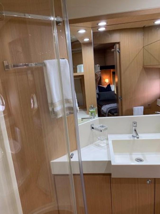 a bathroom with a sink and a mirror aboard 2013 RIVA 75 VENERE SUPER Yacht for Sale