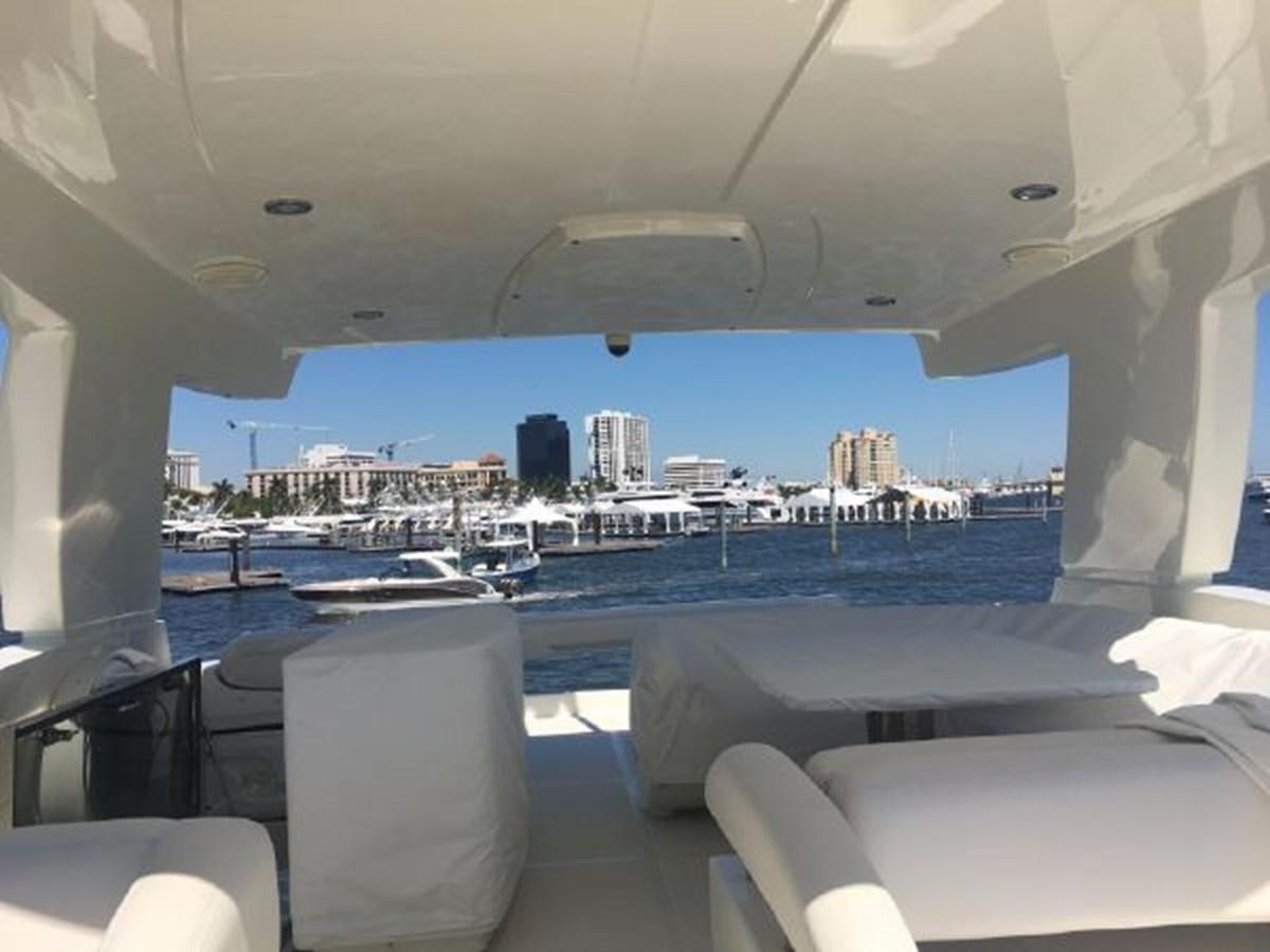 a view of a city from a lounge area aboard 2013 RIVA 75 VENERE SUPER Yacht for Sale