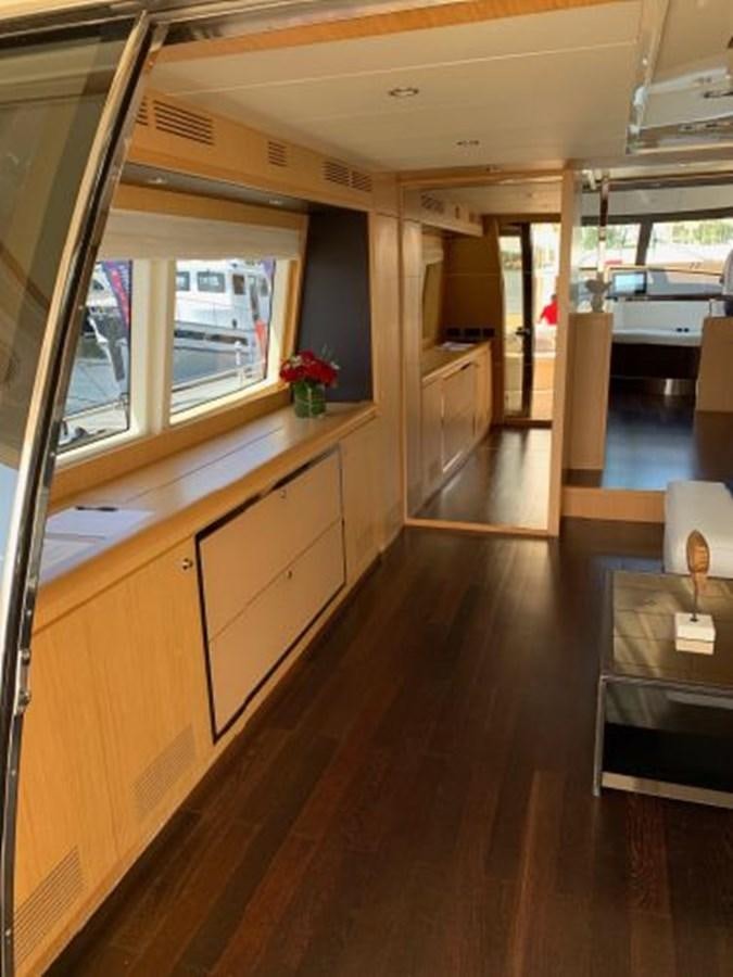 a kitchen with a large window aboard 2013 RIVA 75 VENERE SUPER Yacht for Sale