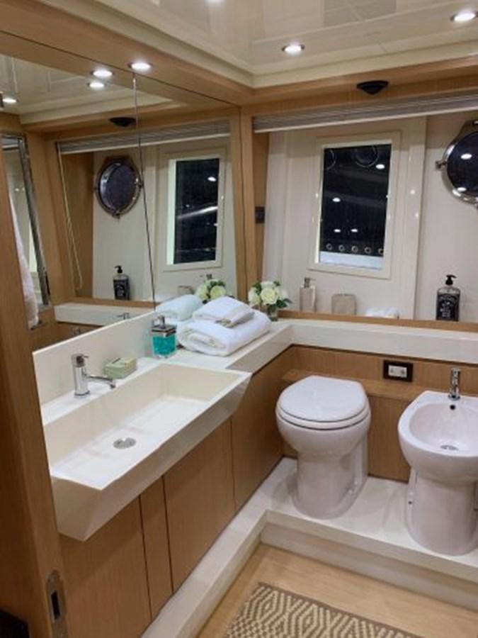 a bathroom with a sink and a toilet aboard 2013 RIVA 75 VENERE SUPER Yacht for Sale