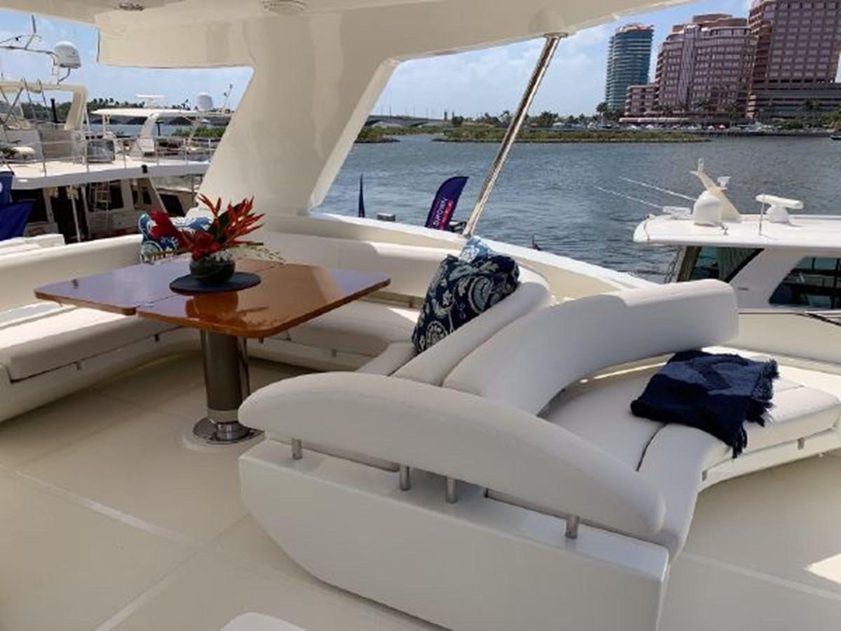 a room with a table and chairs aboard 2013 RIVA 75 VENERE SUPER Yacht for Sale