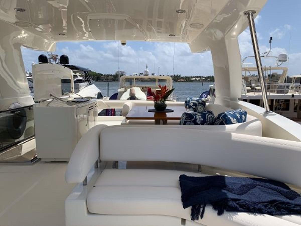 a room with a couch and a table aboard 2013 RIVA 75 VENERE SUPER Yacht for Sale