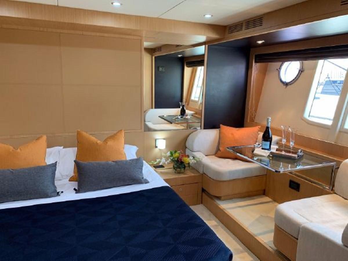 a room with a bed and a couch aboard 2013 RIVA 75 VENERE SUPER Yacht for Sale