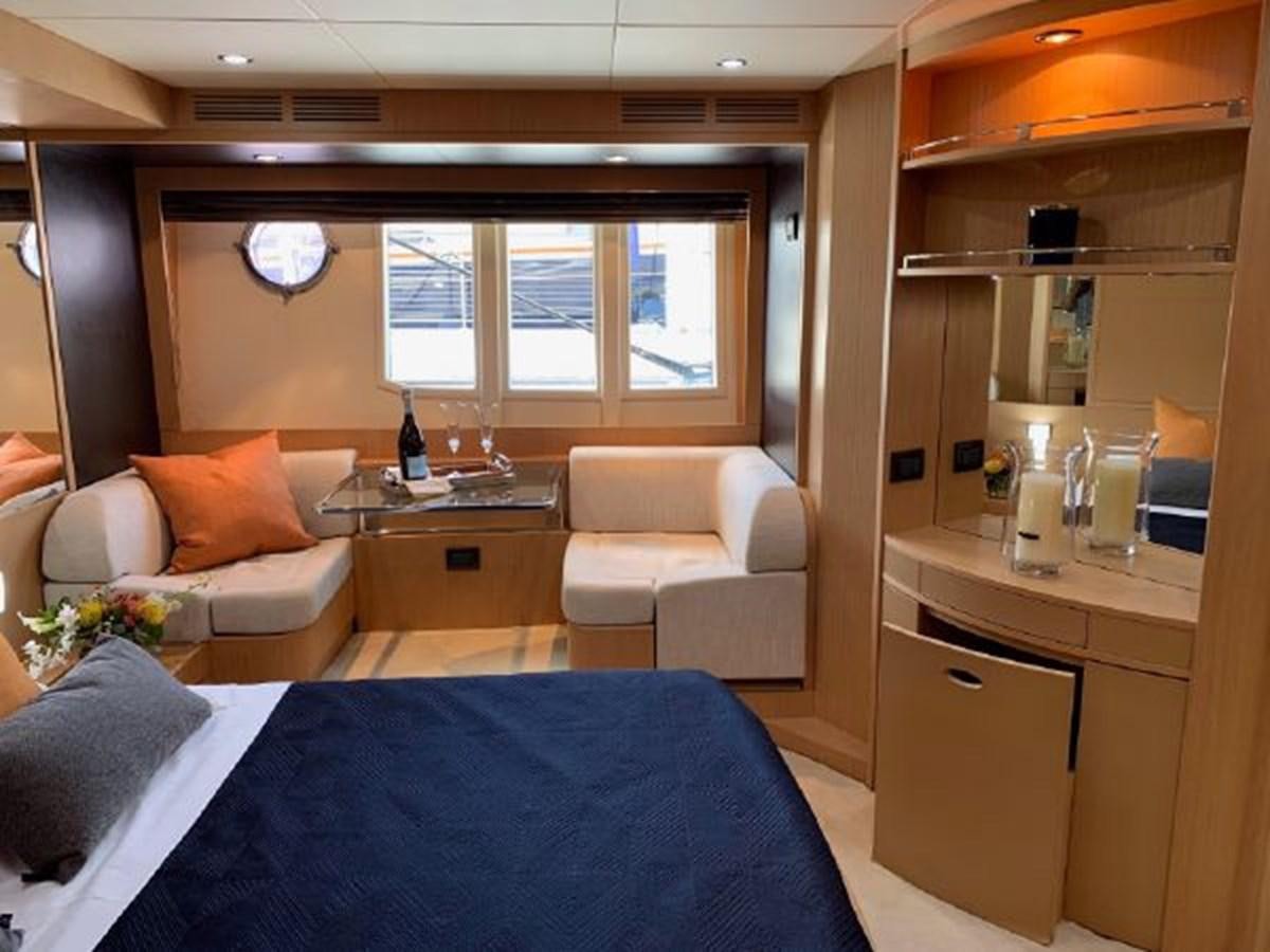 a room with a bed and a desk aboard 2013 RIVA 75 VENERE SUPER Yacht for Sale