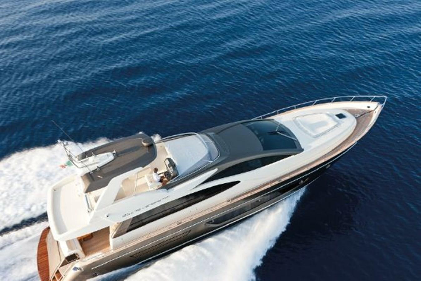 a white yacht on the water aboard 2013 RIVA 75 VENERE SUPER Yacht for Sale