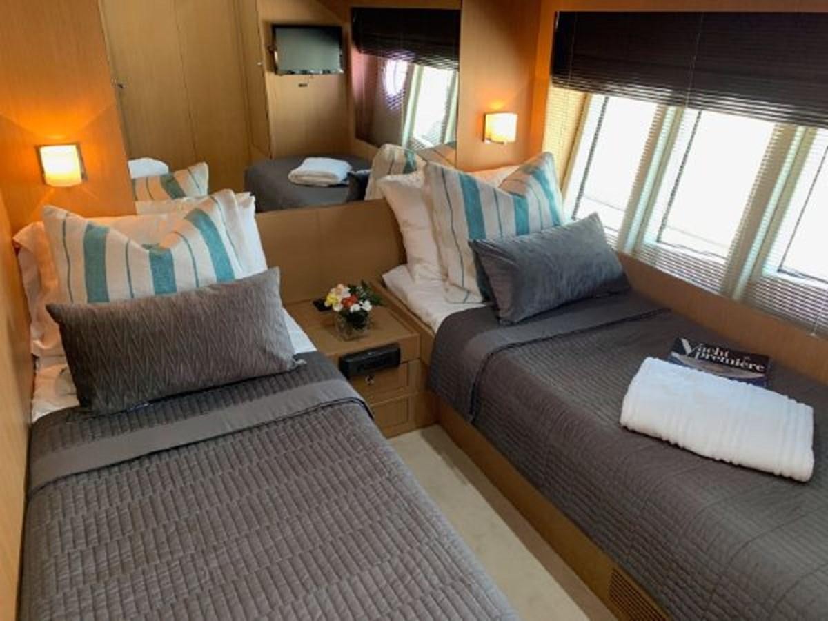 a couple of beds in a room aboard 2013 RIVA 75 VENERE SUPER Yacht for Sale