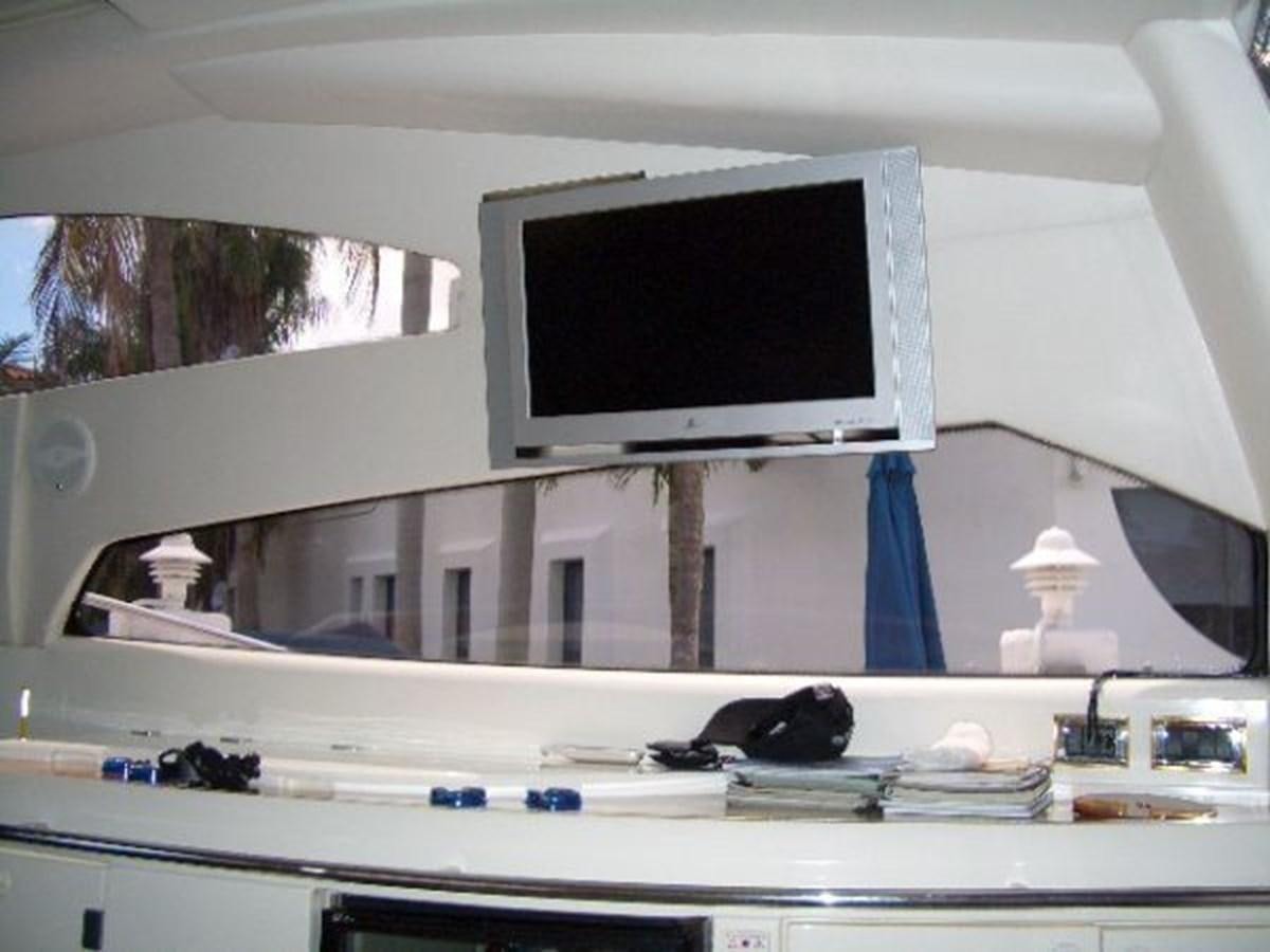 a tv on a shelf aboard H2 Yacht for Sale