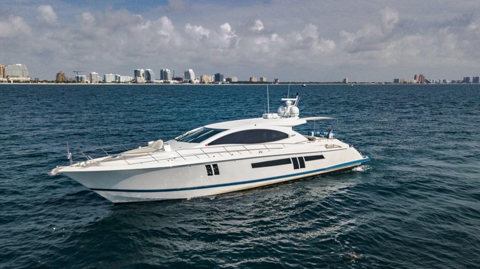 a white yacht in the water aboard MOJO Yacht for Sale