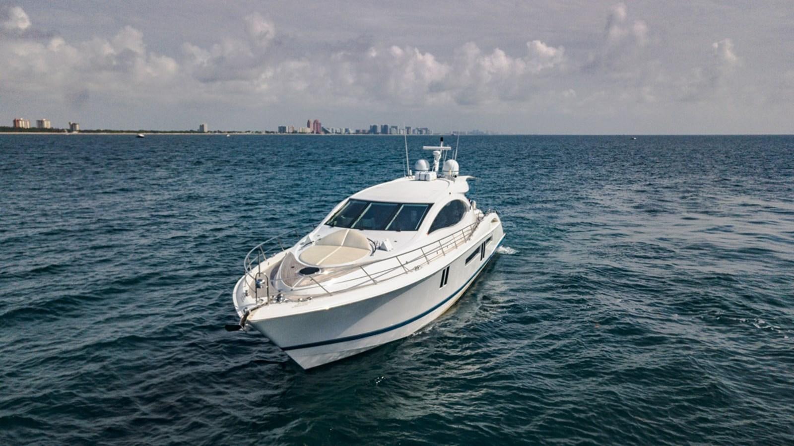 a white boat in the water aboard MOJO Yacht for Sale