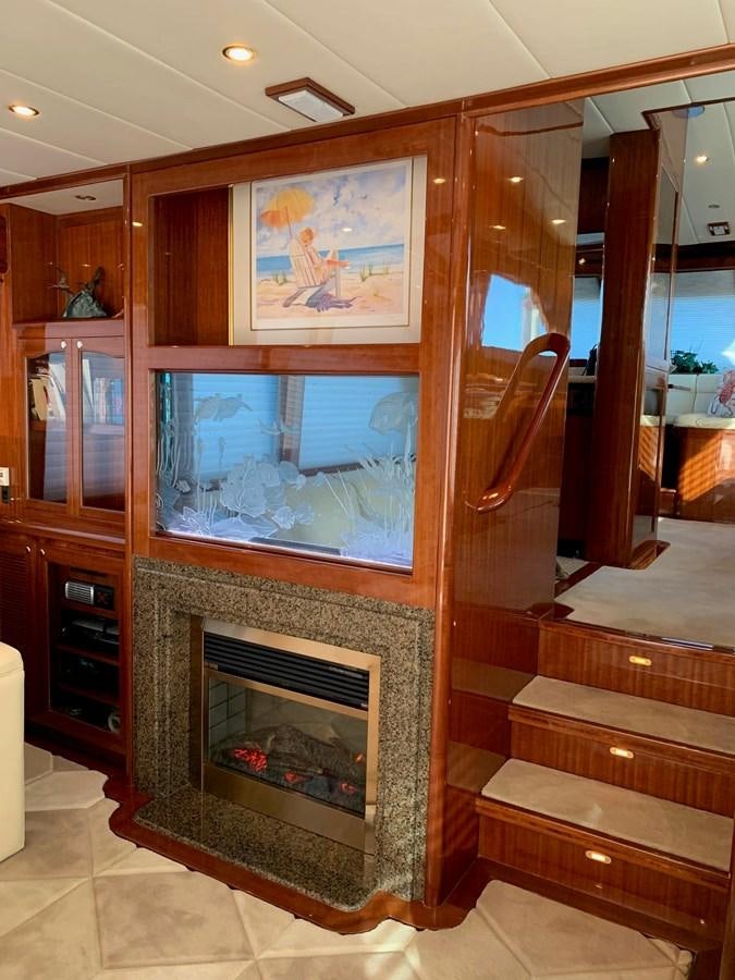 a fireplace in a room aboard TAKEN TIME II Yacht for Sale
