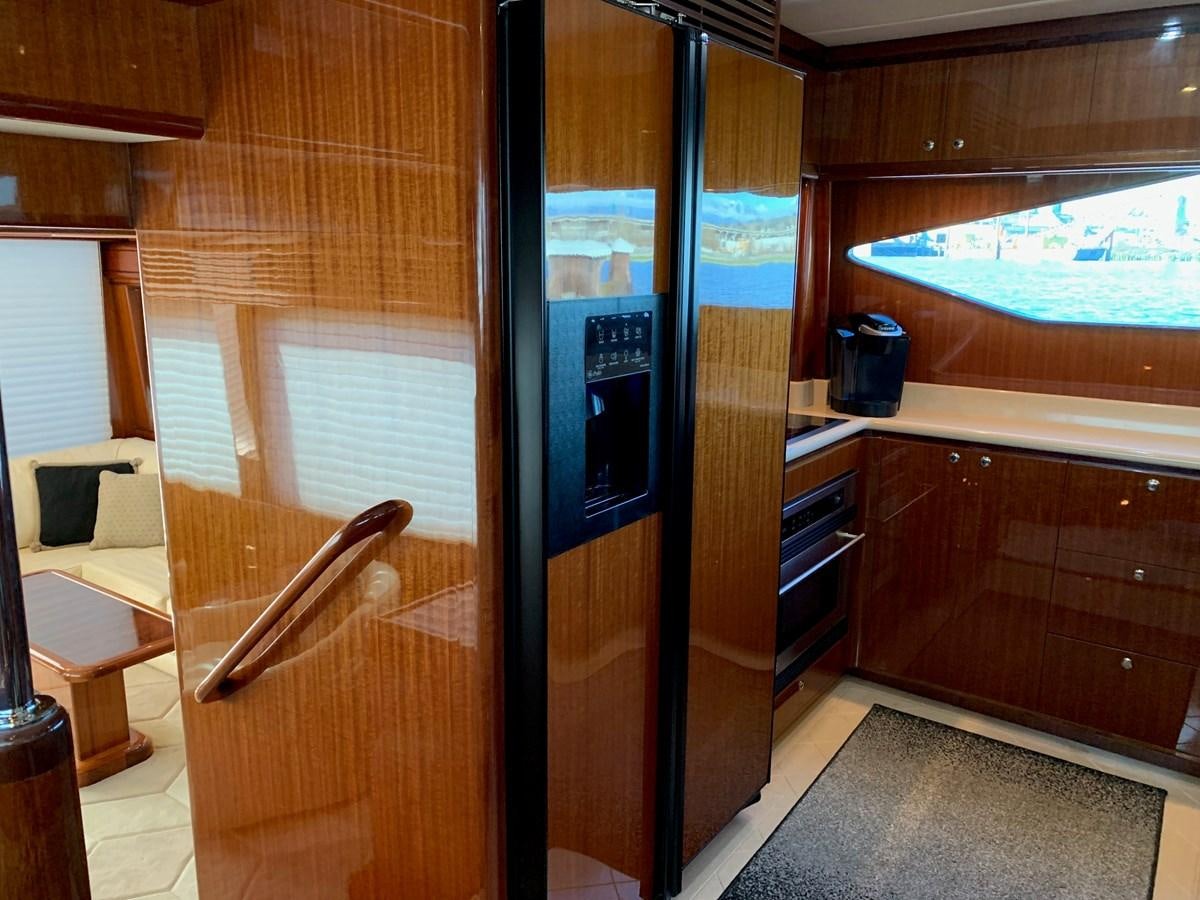 a room with a sliding door aboard TAKEN TIME II Yacht for Sale