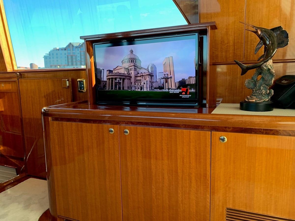 a tv on a cabinet aboard TAKEN TIME II Yacht for Sale