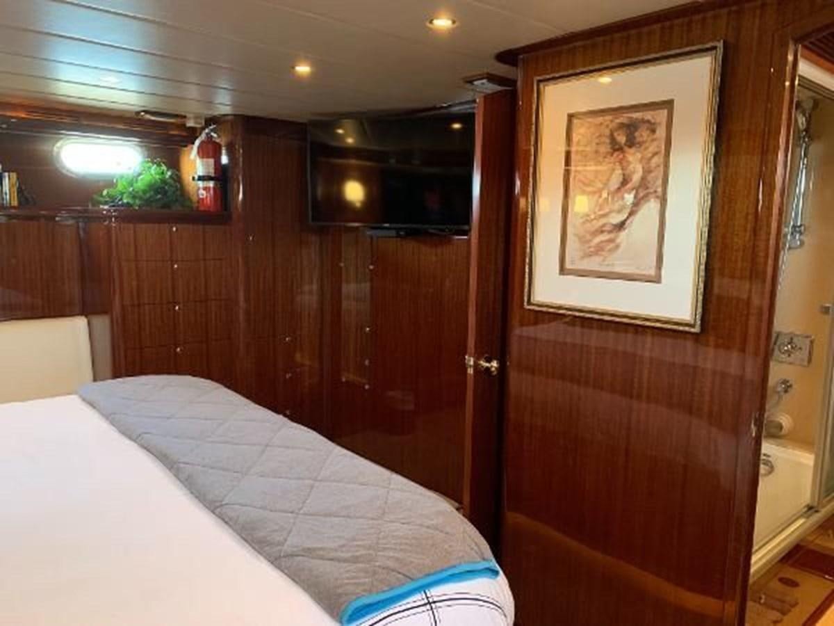 a bed in a room aboard TAKEN TIME II Yacht for Sale