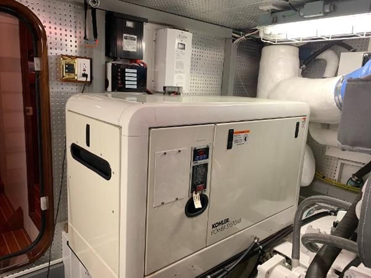 a machine in a room aboard TAKEN TIME II Yacht for Sale