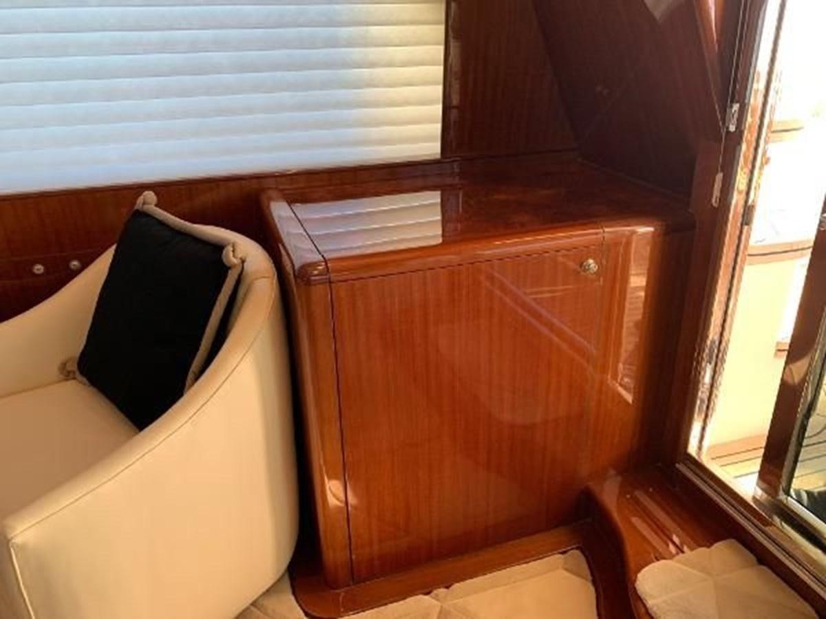 a bed with a pillow on it aboard TAKEN TIME II Yacht for Sale