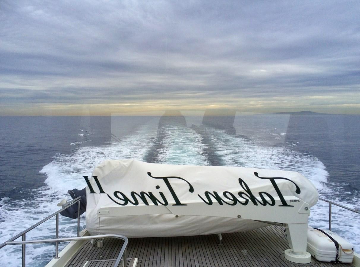 a boat on the water aboard TAKEN TIME II Yacht for Sale