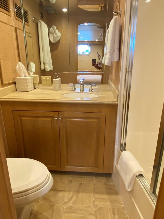 a bathroom with a sink and toilet aboard LUISA Yacht for Sale