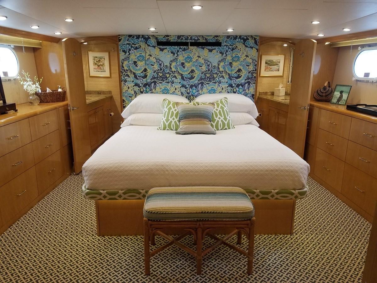 a bed in a bedroom aboard LUISA Yacht for Sale