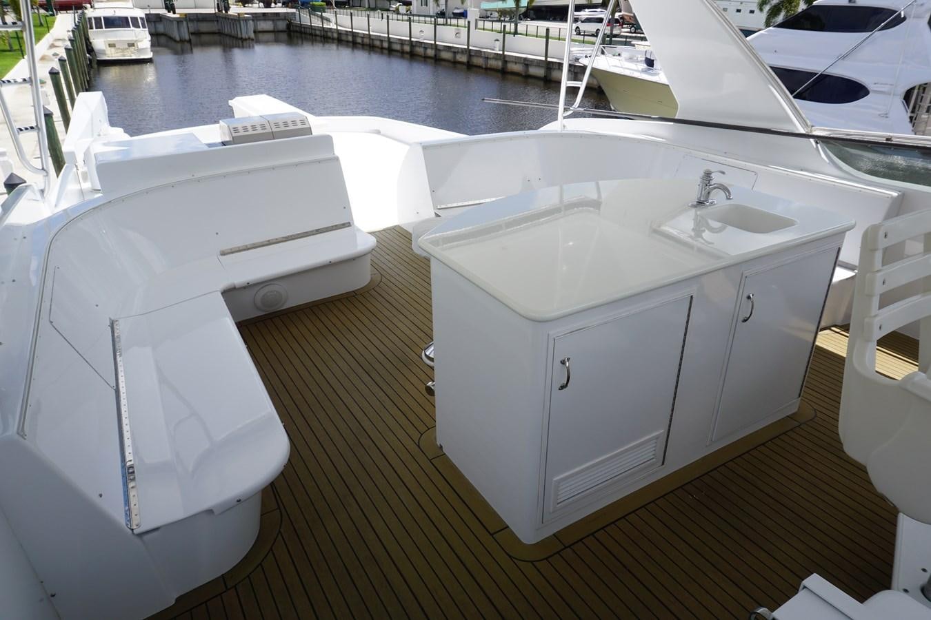 a white sink on a deck aboard LUISA Yacht for Sale
