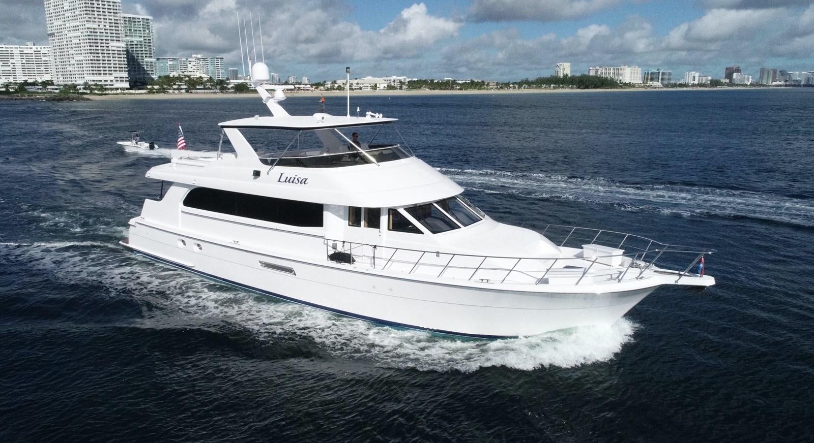 a white yacht in the water aboard LUISA Yacht for Sale