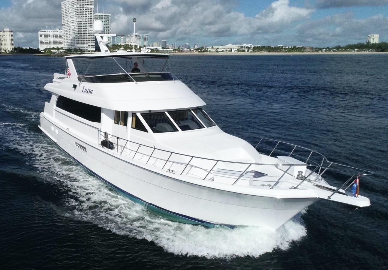 a white yacht on the water aboard LUISA Yacht for Sale