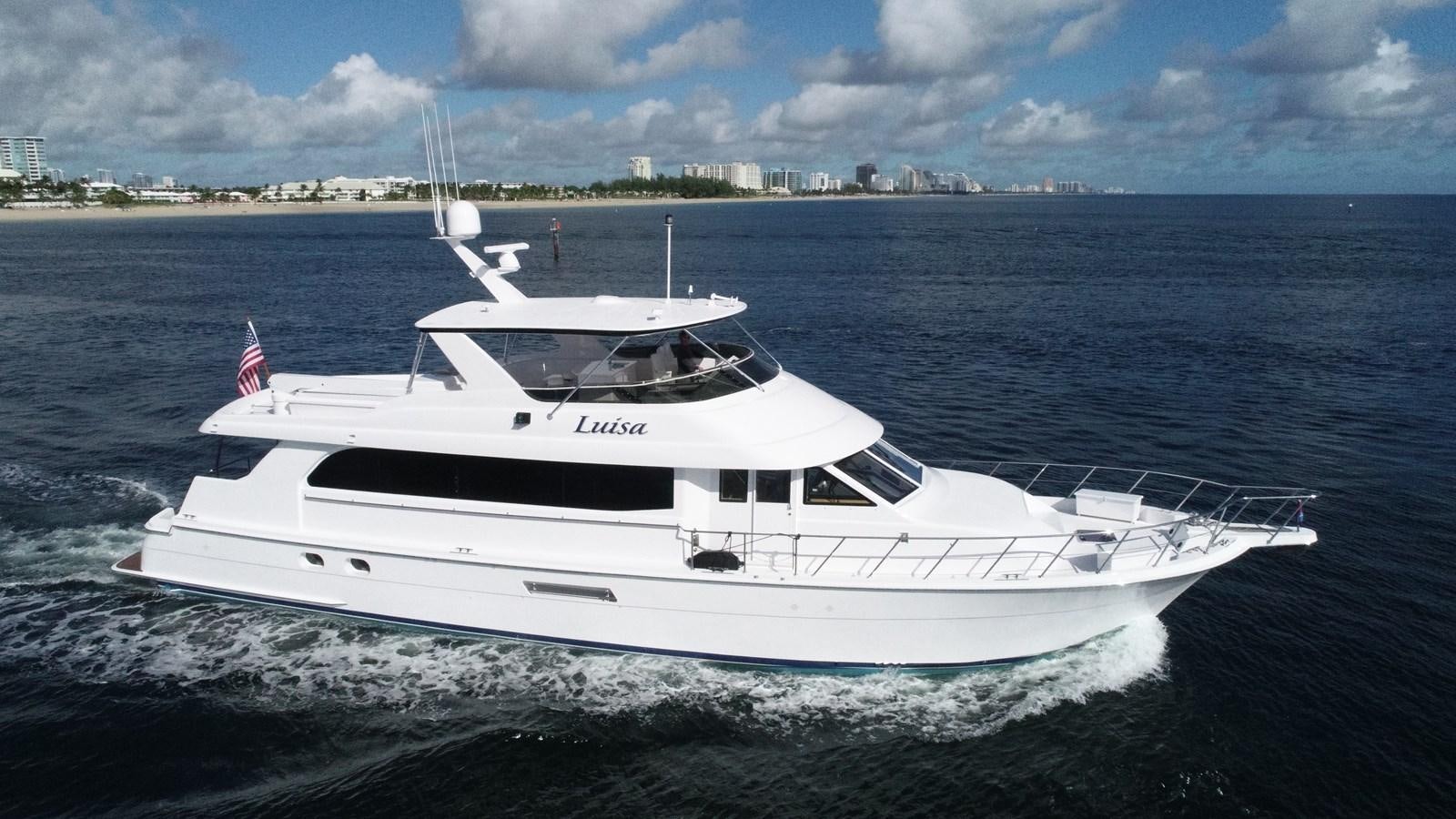 a white yacht in the water aboard LUISA Yacht for Sale