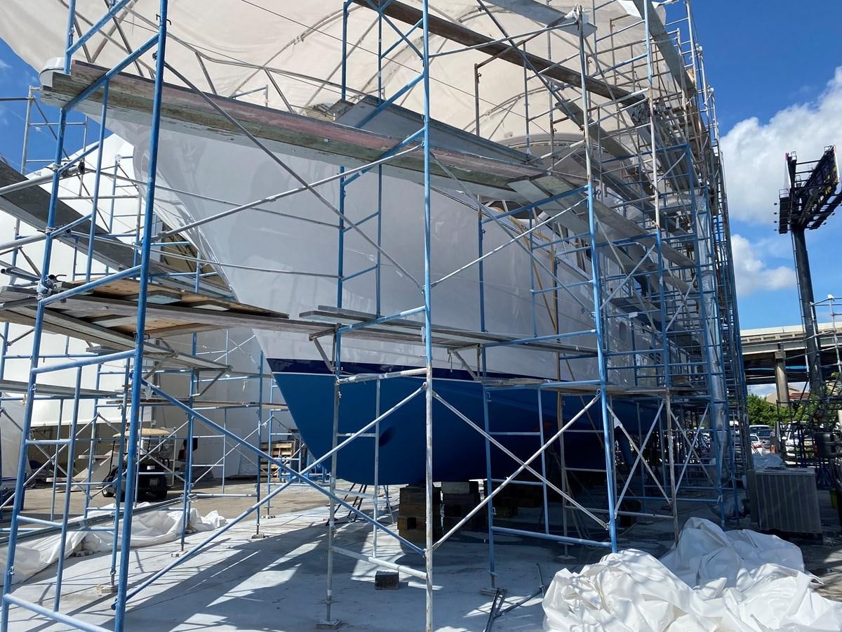 a building with a glass wall aboard LUISA Yacht for Sale