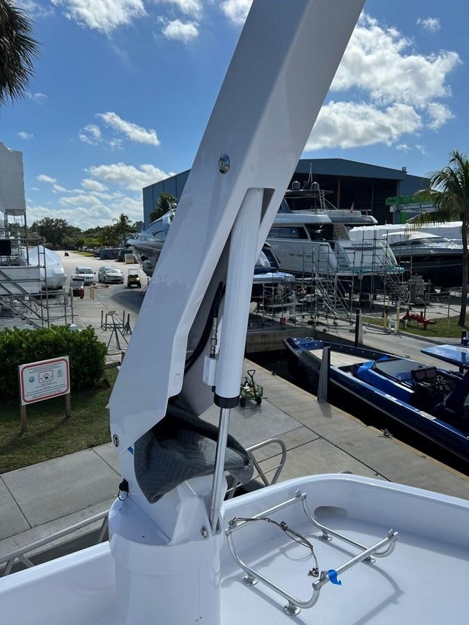 a white boat with a metal frame aboard LUISA Yacht for Sale