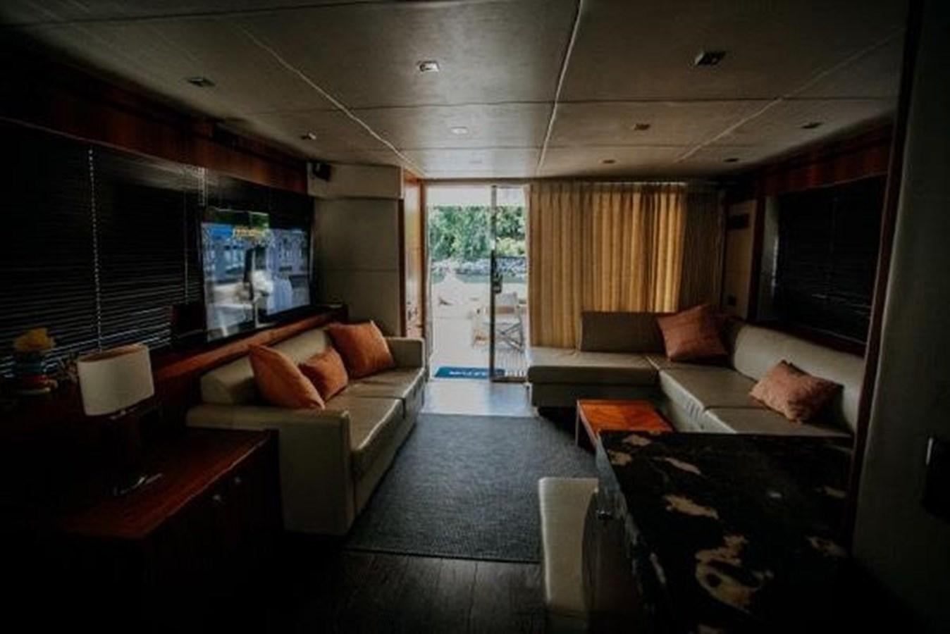 a living room with a couch and a table aboard ASTUR Yacht for Sale