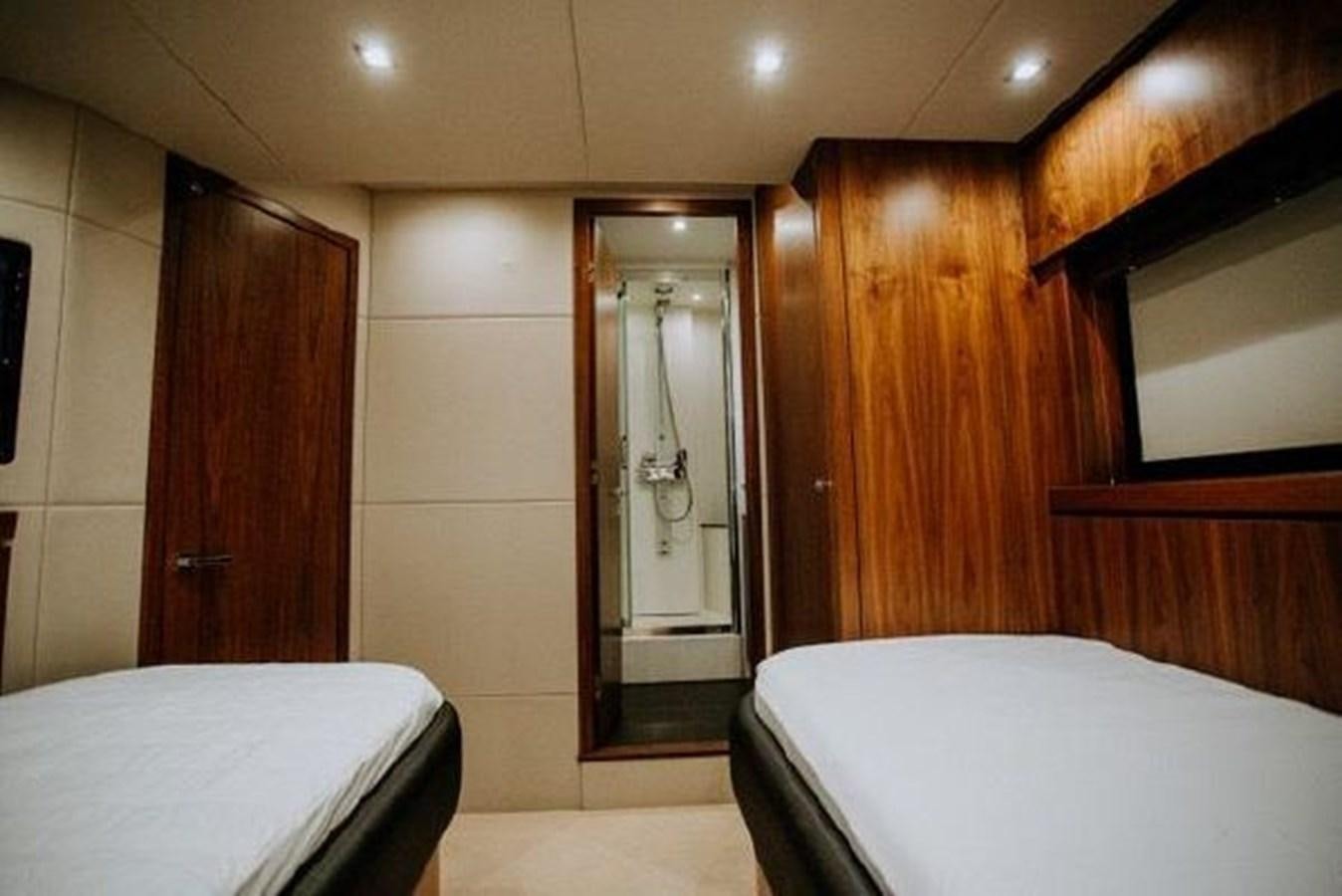 a room with a mirror and a bed aboard ASTUR Yacht for Sale